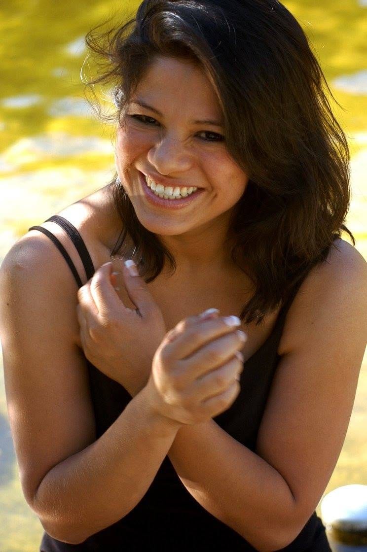 Portrait by the water, laughing